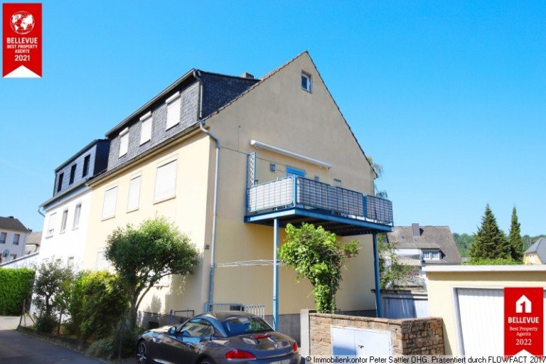 Ansicht mit den Garagen Koblenz Mehrfamilienhaus Invest gegen die Inflation!